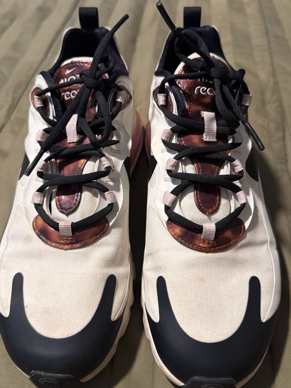 Women’s nikeCream and Black Athletic Sneakers with Metallic Rose Accents